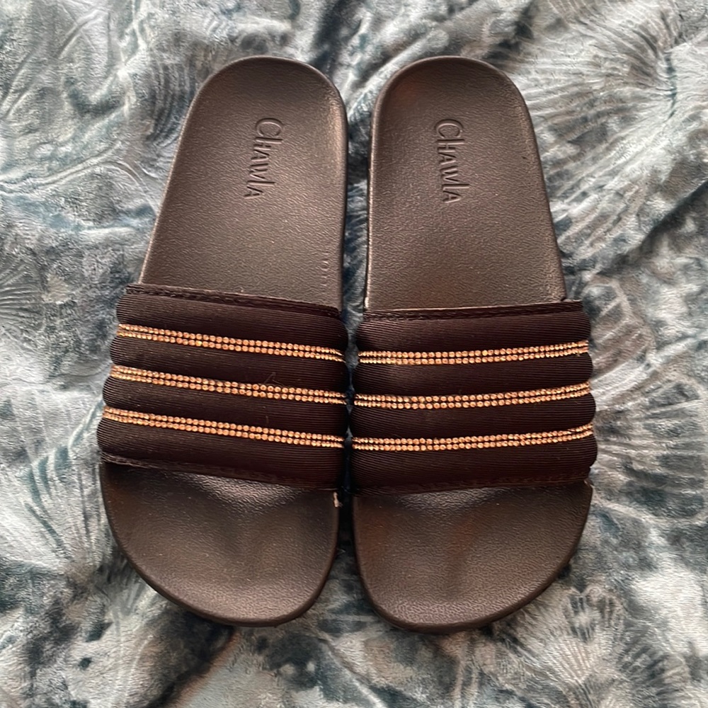 BRAND NEW NEVER WORN size 6 black and gold slides